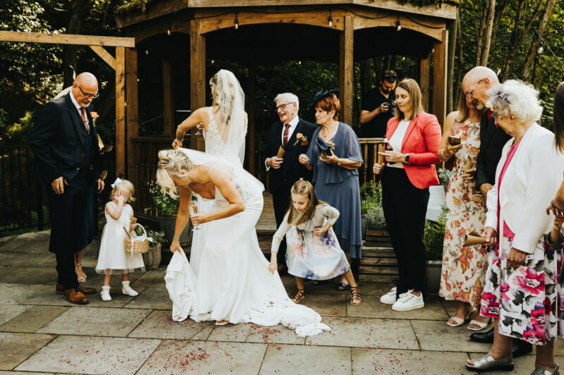 Two Brides, One Incredible Day – The Venue Bowers Mill Wedding Photography 51 Candid laughter between two brides The Venue Bowers Mill wedding photography