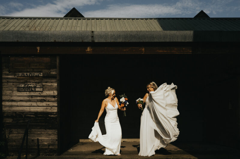 Two Brides, One Incredible Day – The Venue Bowers Mill Wedding Photography 36 Relaxed couple portrait by the bridge at The Venue Bowers Mill Halifax