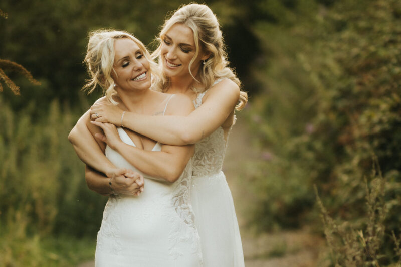 Two Brides, One Incredible Day – The Venue Bowers Mill Wedding Photography 47 Golden hour portrait by the lake The Venue Bowers Mill Halifax wedding photographer