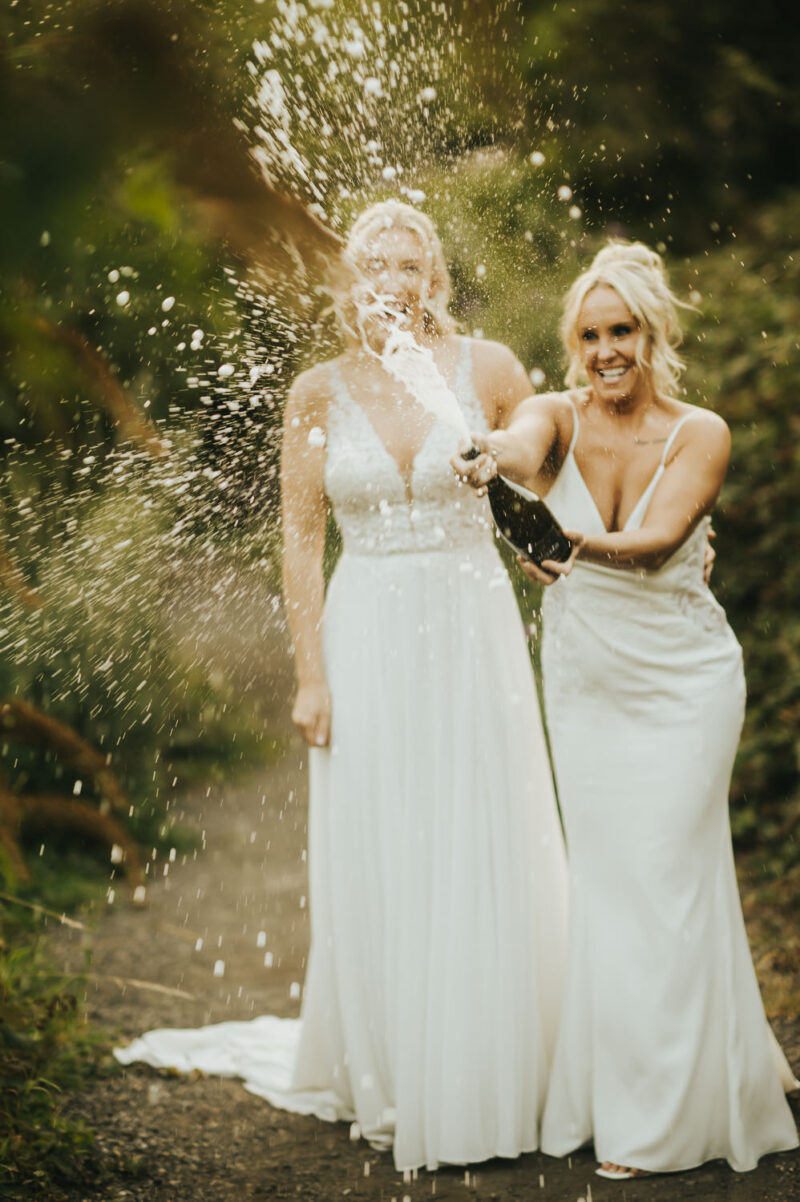 Two Brides, One Incredible Day – The Venue Bowers Mill Wedding Photography 49 prosecco spray The Venue Bowers Mill Halifax wedding photographer