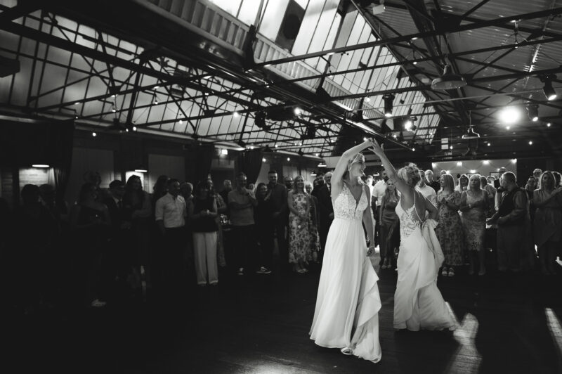 Two Brides, One Incredible Day – The Venue Bowers Mill Wedding Photography 75 Two brides dancing together on the packed dance floor The Venue Bowers Mill Halifax